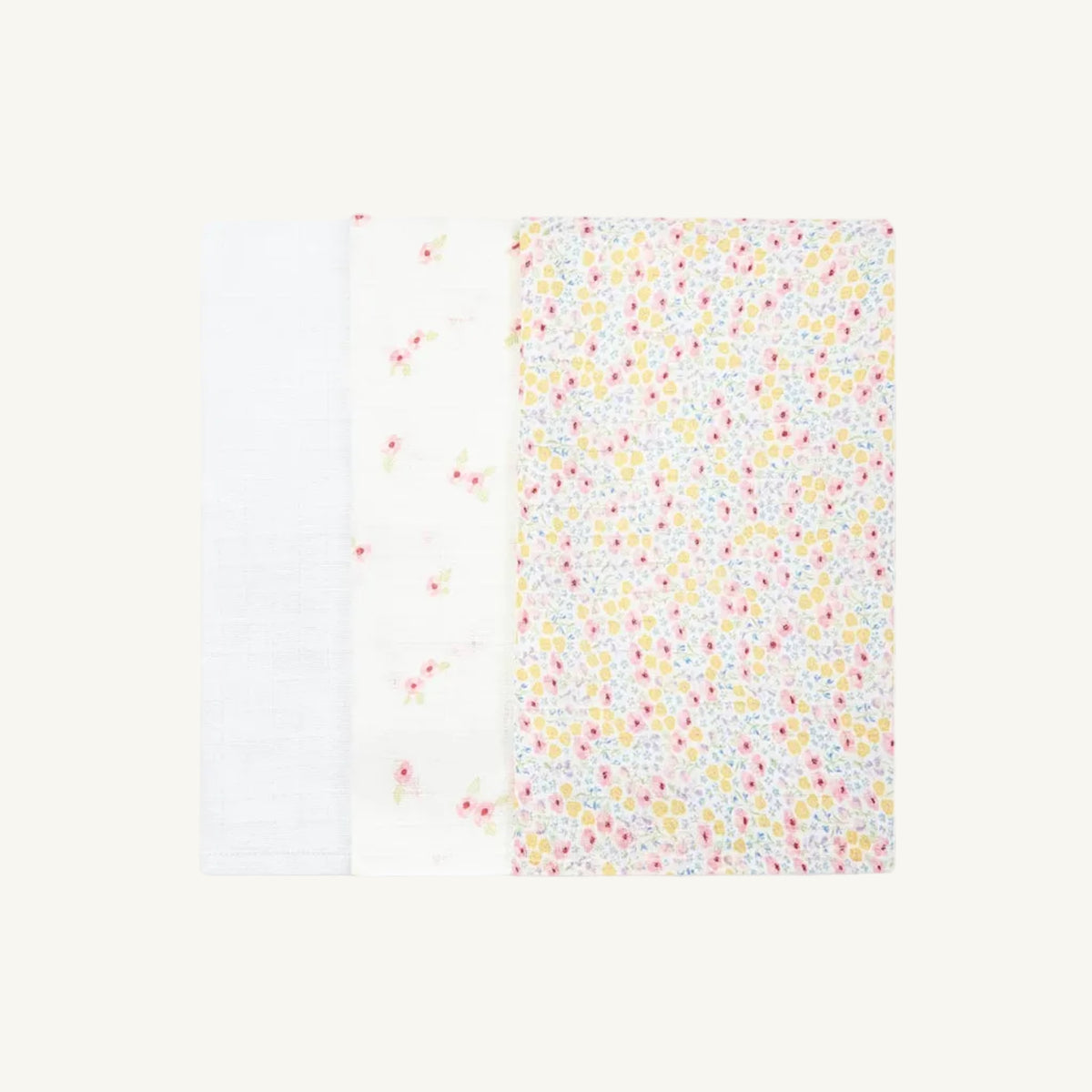 Avery Row Organic muslin squares in wildflower with a colorful floral pattern on a white background