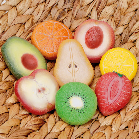 Yellow Door fruit sensory play stones in a wicker basket