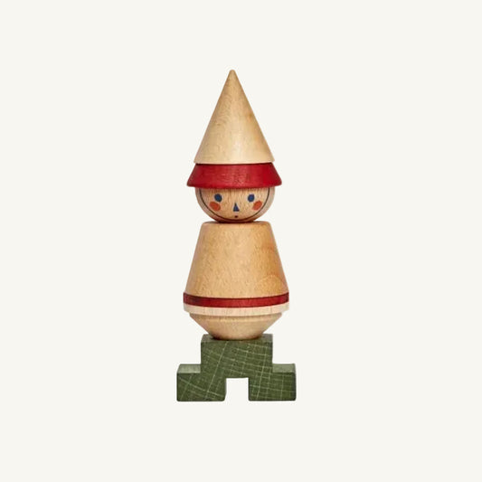 Wooden figurine with a conical hat and green base on a white background