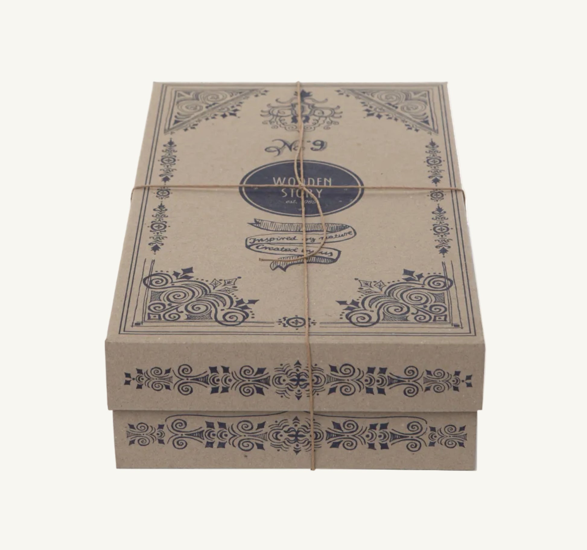 Decorative cardboard box with intricate patterns and 'Wooden Story' branding on a white background