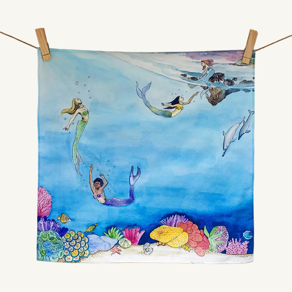 Colorful illustration of mermaids and dolphins underwater with coral on a white background.