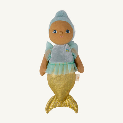 A mermaid-themed plush doll with light blue hair, a pale turquoise tutu, and a glittery gold mermaid tail, shown against a plain off-white background.