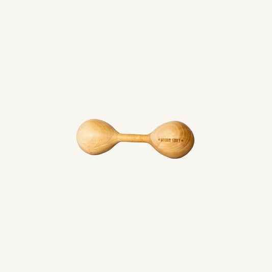 Wooden Story baby rattle on a white background
