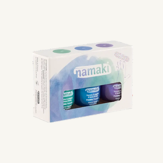 Namaki Aurora Nail varnish Kit in its original packaging, featuring a white box with a blue and purple watercolor design and a clear window showing three nail varnish bottles inside.