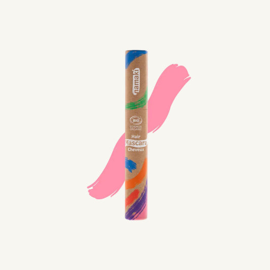 A tube of Pink Namaki Bio Hair Mascara on a white background, overlaid with a pink hair swatch graphic.