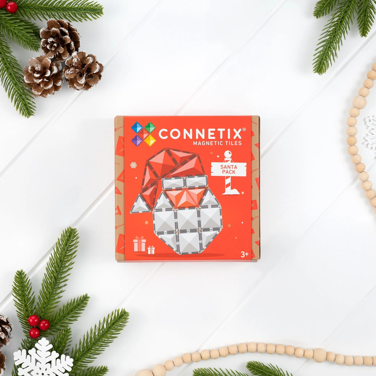 CONNETIX Magnetic tiles Christmas Santa Pack Box on white background with christmas decorations